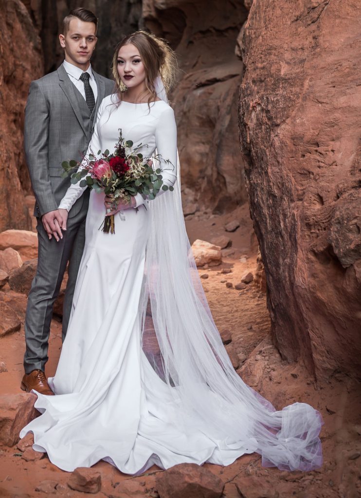 fitted crape wedding dress with long sleeves
